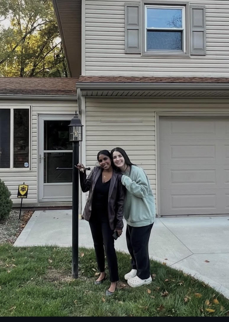 Angie with a client at their new home